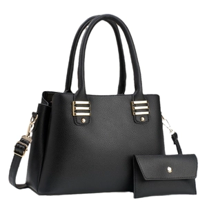 Classic black pebble leather tote bag with gold hardware and matching coin purse set