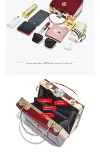 Detail view of red patent leather evening bag with four internal storage compartments