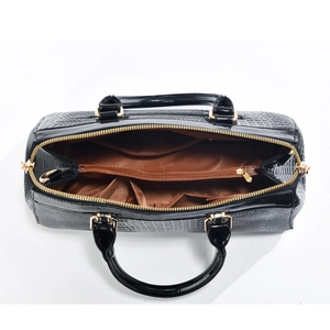 Top view of large glossy tote bag with three compartments and golden hardware details