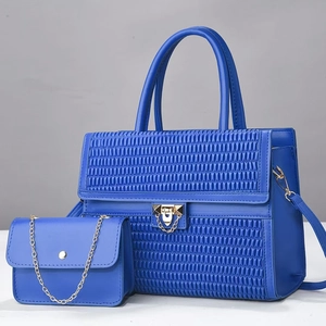 Blue quilted tote bag set with golden hardware and matching mini chain crossbody bag
