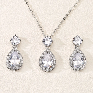 Elegant silver teardrop zircon necklace and earrings set with halo design for women