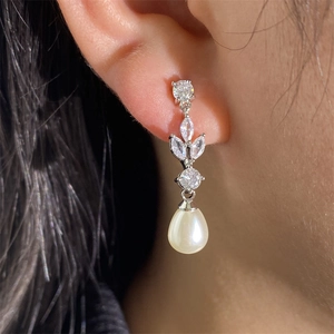 Elegant long drop earrings with white pearls and sparkling marquise crystals for women