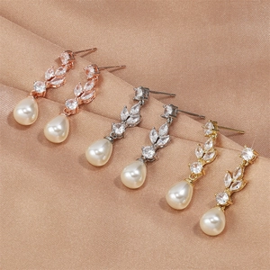 Elegant water drop pearl earrings with leaf-shaped cubic zirconia in three metal finishes