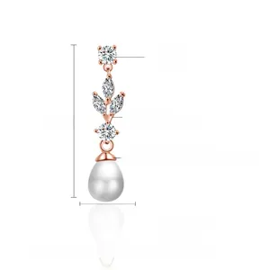 Detailed view of 33mm rose gold teardrop pearl earrings with AAA cubic zircon crystals