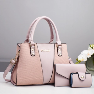 Three-piece pink handbag set with crocodile texture and metallic Danbaoly logo detail