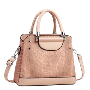 Pink pleated leather tote bag with silver handles and detachable shoulder strap in soft pink