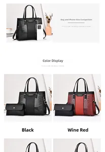 Details des eleganten zweiteiligen Handtaschen-Sets mit Kroko-Prägung in Schwarz und Weinrot