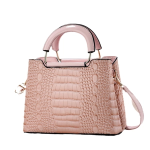 Elegant light pink handbag with crocodile pattern texture and top handles for women