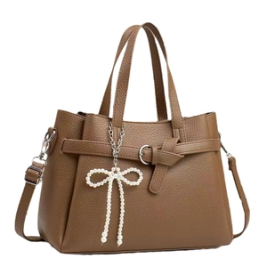 Brown lychee texture handbag with pearl bow pendant and detachable shoulder strap