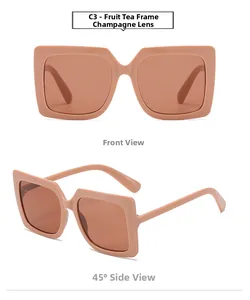 Détail de lunettes de soleil carrées avec monture thé et verres champagne de haute qualité