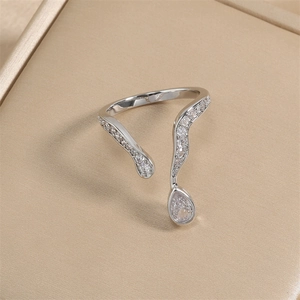 Elegant adjustable silver snake ring with pavé crystals and pear-shaped drop stone
