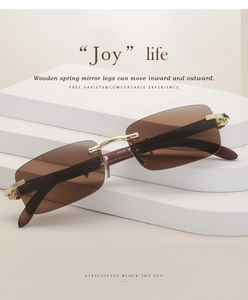 Detail of rimless square sunglasses with wooden temples and adjustable spring hinges