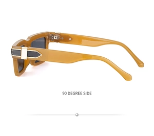 90 degree side view of amber tortoise square sunglasses with gold metal temple hinge detail