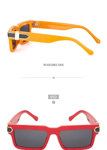 Detail view of vintage square sunglasses in orange and red with metallic hinges
