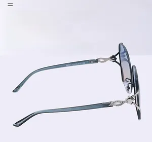 Detail of TR90 temple with leaf-shaped metal inlay and diamonds on polarized sunglasses