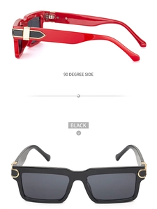 Detail view of red square sunglasses side profile and black frame with golden metal hinge