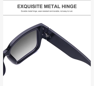 Detailed close-up of durable silver metal hinges on black oversized square sunglasses