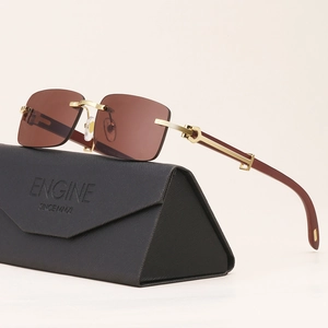 Frameless wood grain sunglasses with brown lenses and golden C-shaped metal accents