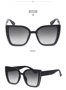 Front and side view of cat eye sunglasses with gold trim and gray gradient lenses