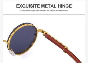 Detail of durable gold metal hinges on retro round sunglasses with wood texture temples