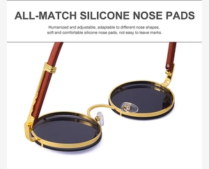 Detail of adjustable silicone nose pads on retro round metal frame sunglasses