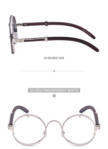 Detail of round silver metal frame sunglasses with premium dark brown wood grain temples