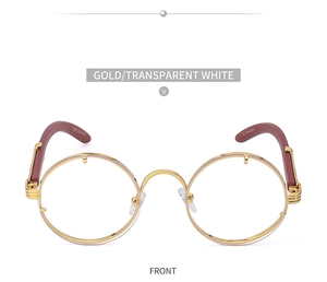 Detail of retro round gold metal sunglasses frame with UV protection marking