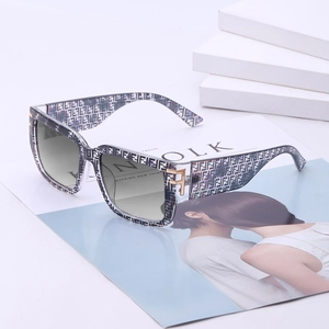 Women's oversized square sunglasses with monogram frames and gradient lenses