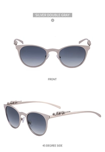 Dettaglio occhiali da sole cat-eye in metallo argento con decorazione a testa di leopardo