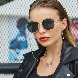 Lunettes de soleil octogonales en métal avec verres sombres et chaîne dorée