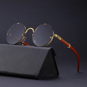 Retro rimless round sunglasses with gold metal hinges and wood texture temples in case