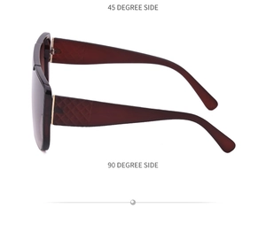 Detail view of large square sunglasses with textured diamond pattern on the brown temples