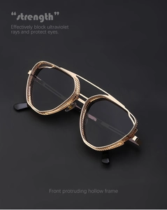 Detail of golden steampunk sunglasses featuring hollow metal frames and side mesh shields