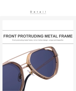 Detail of hollow steampunk sunglasses featuring a gold metal frame and dark lenses