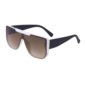 Oversized white frame sunglasses with black textured temples and brown gradient lenses