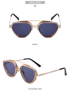 Detail of steampunk sunglasses with hollow side mesh frame and gold gray tinted lenses
