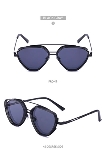 Close-up of steampunk sunglasses featuring side metal mesh shields and double bridges