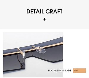 Détail des plaquettes de nez en silicone et pont doré sur lunettes de soleil oversize