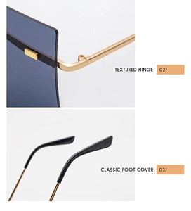 Vue détaillée des charnières dorées et des embouts noirs de lunettes de soleil oversize