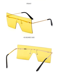 Vues détaillées de face et de profil de lunettes de soleil oversize à verres jaunes et métal