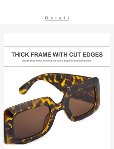 Detailed close-up of retro tortoiseshell sunglasses with thick frames and cut edges