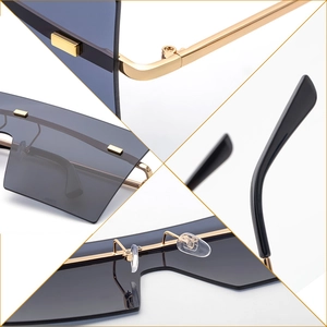 Lunettes de soleil shield sans monture pour femme avec cadre doré et verres gris clair