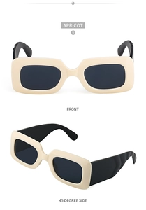 Macro view showing the apricot rectangular frame and textured black temples of the sunglasses