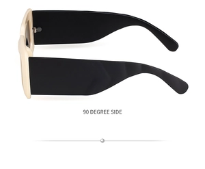 Detailed 90-degree side view of vintage wide-frame sunglasses with thick black temples