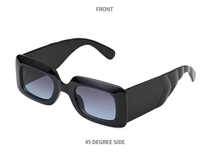 Side view of trendy black rectangular sunglasses with gradient blue lenses on white backdrop