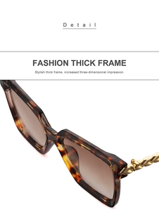 Detail of tortoise shell thick frame sunglasses with premium gold chain textured temples