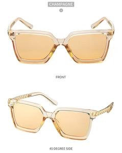 Detail of champagne square sunglasses with textured metal temples and translucent frame