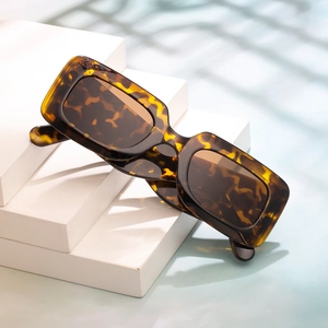 Vintage tortoiseshell rectangle sunglasses with thick frame on geometric blocks