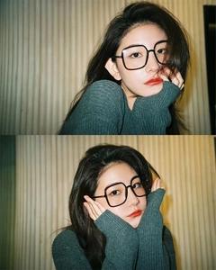 Close-up of oversized black square frame glasses on model for face slimming effect