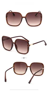 Three-view layout of transparent brown oversized square sunglasses with gold metal hinges